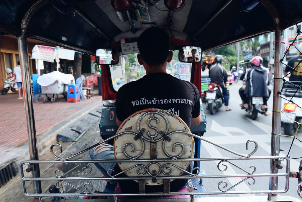 Tuk tuk ride through streets of Bangkok Thailand