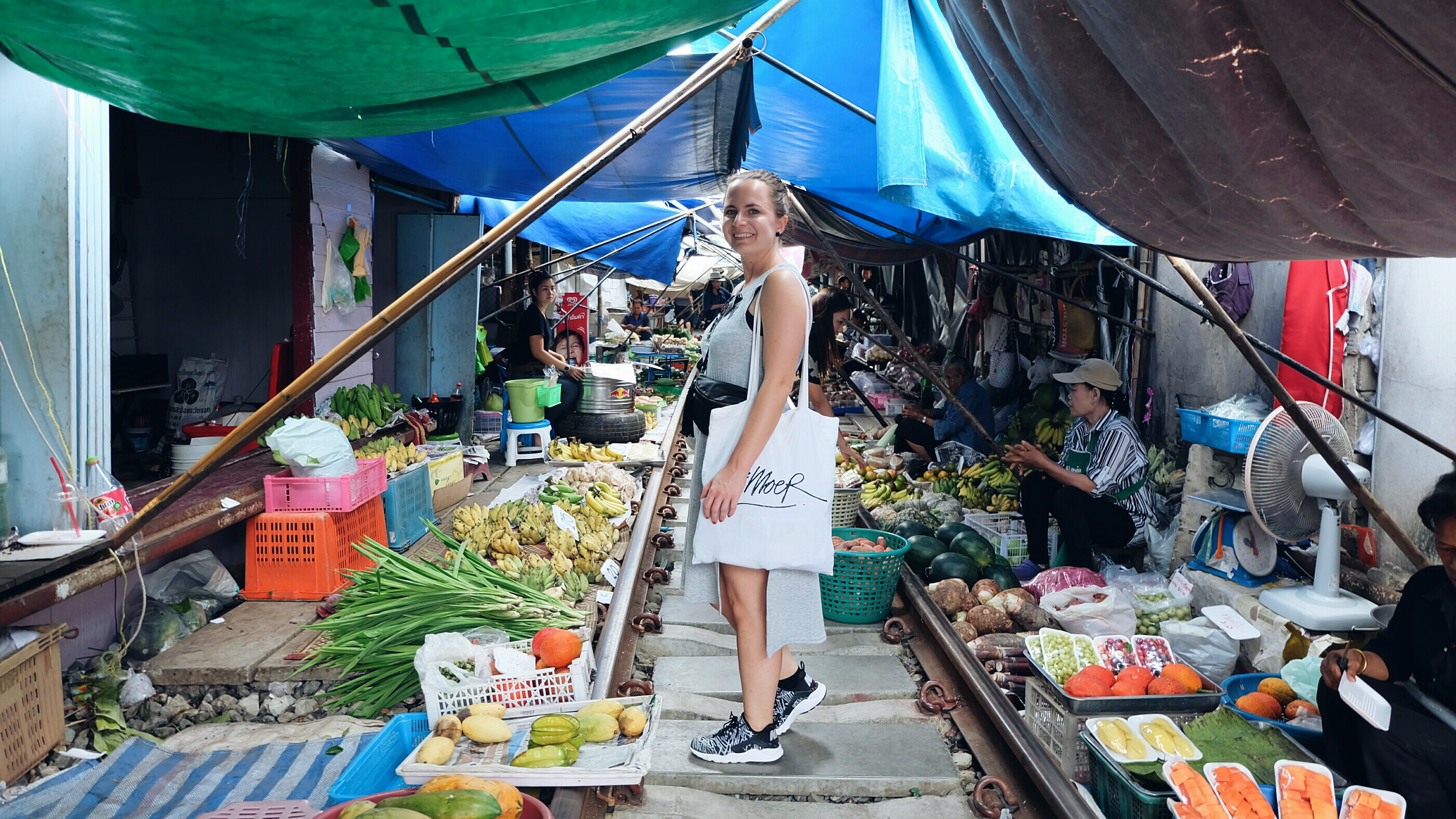 self portret Maeklong railway market Thailand