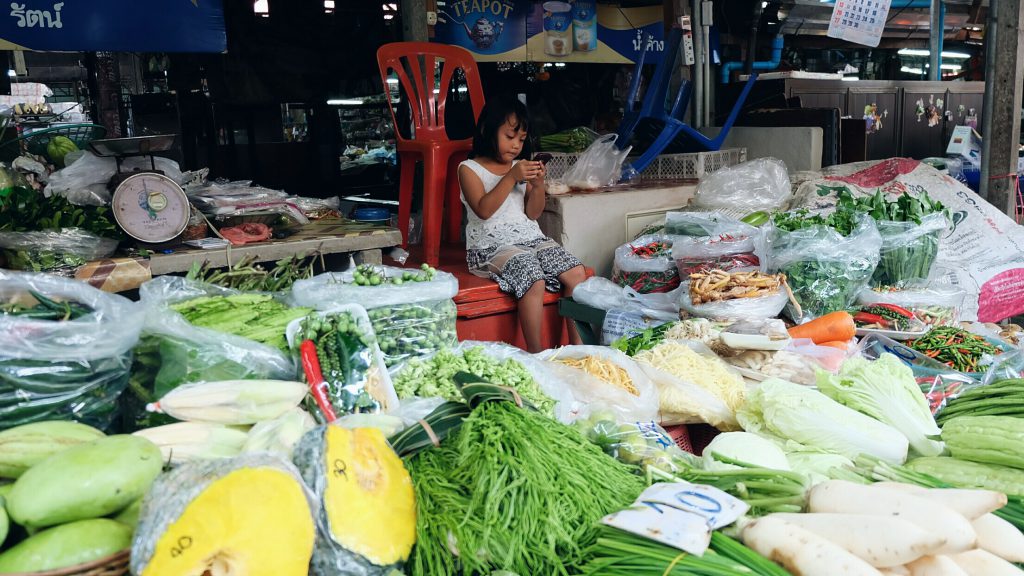 Thai kid local market Maeklong