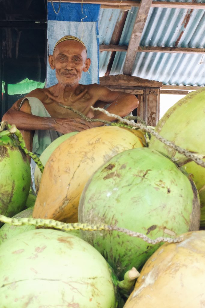 coconut man Sulawesi Indonesia